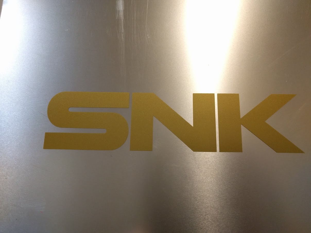 2 pack SNK text logo Vinyl sticker Gold Metallic 7 3/4″ x 1 3/4″ ( 200mm x 36mm)