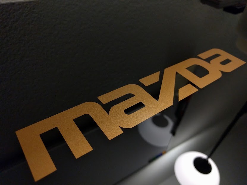 2 pack-Mazda logo Gloss Gold Metallic vinyl Decal Sticker 15.75″ x 2.75″
