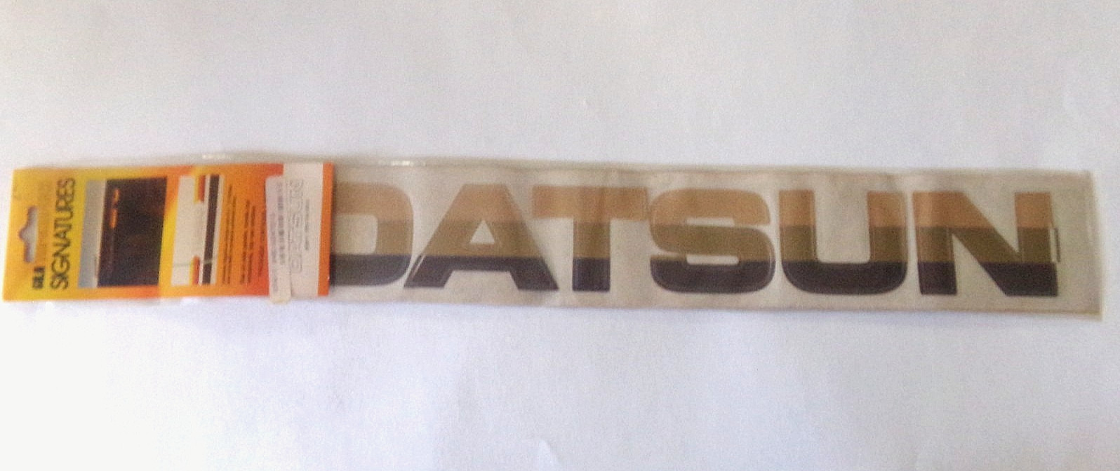 Vintage 1982 GILA Tri-Graphics Sticker Windshield DATSUN Multi Tone Brown NOS