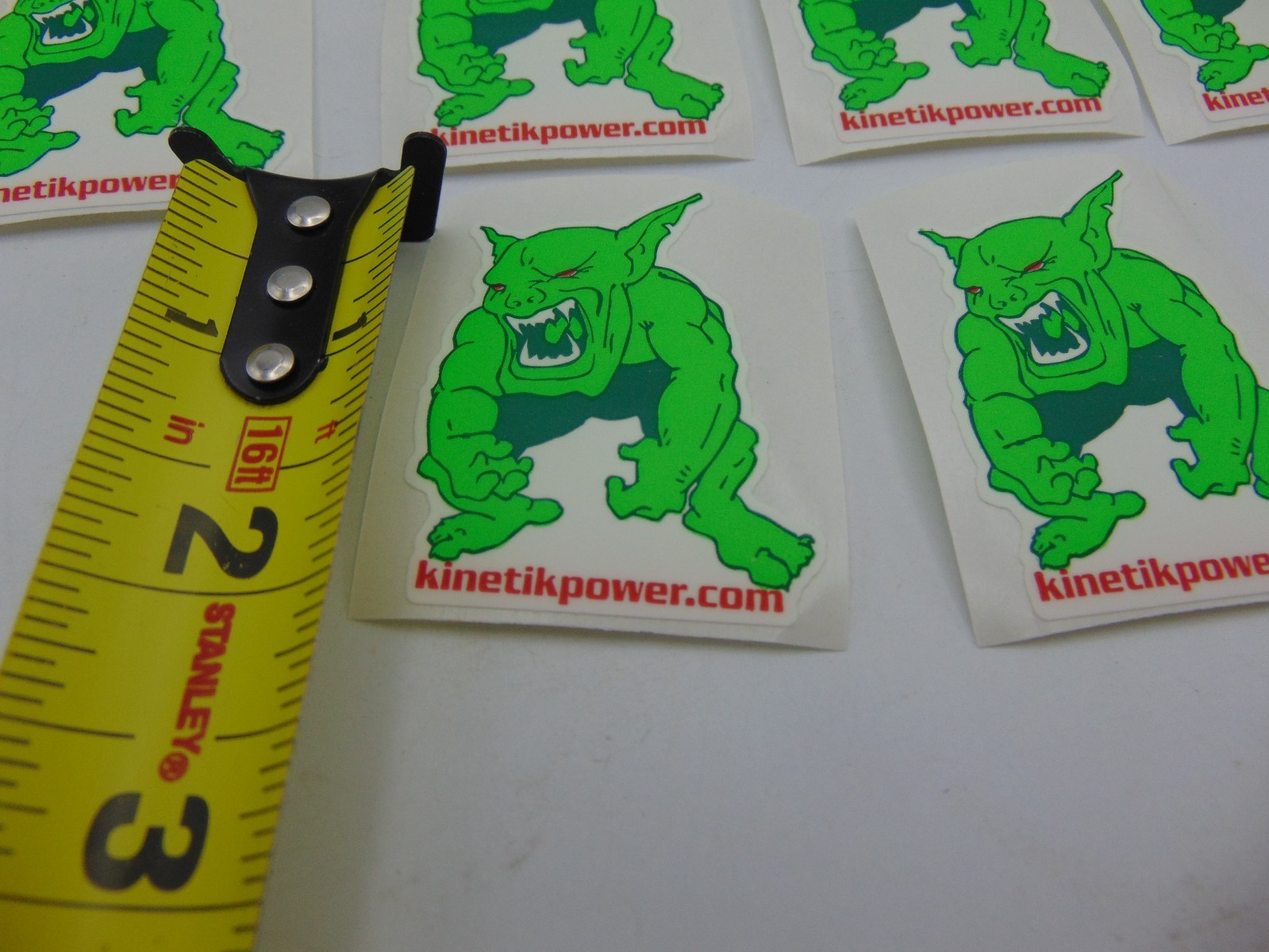 2″ Tall KINETIK POWER Battery Logo Plastic Decal Green Monster (lot of 10)