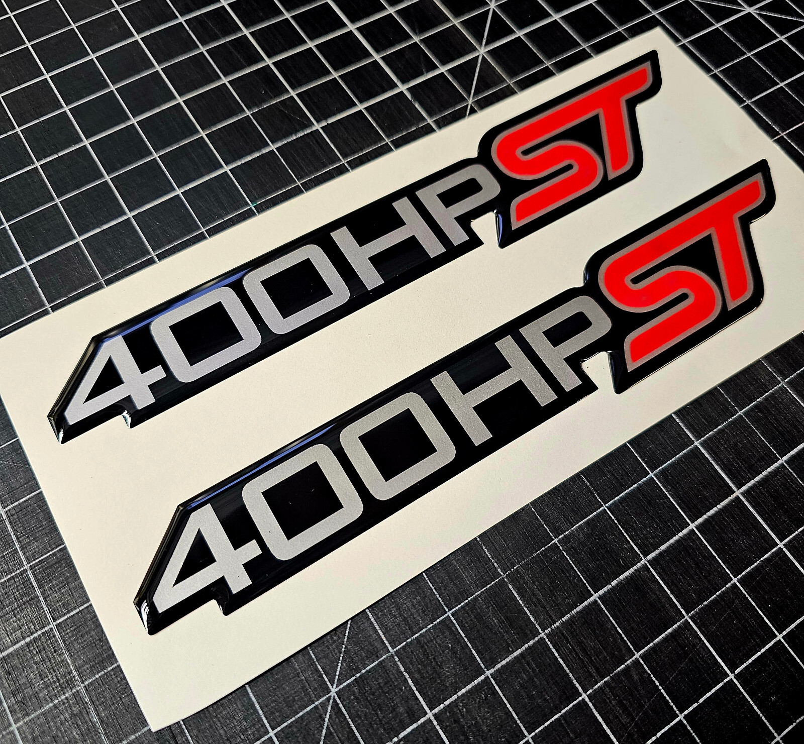 (2) Gel-coated badges Ford Explorer ST 400hp Ecoboost Silver/red black