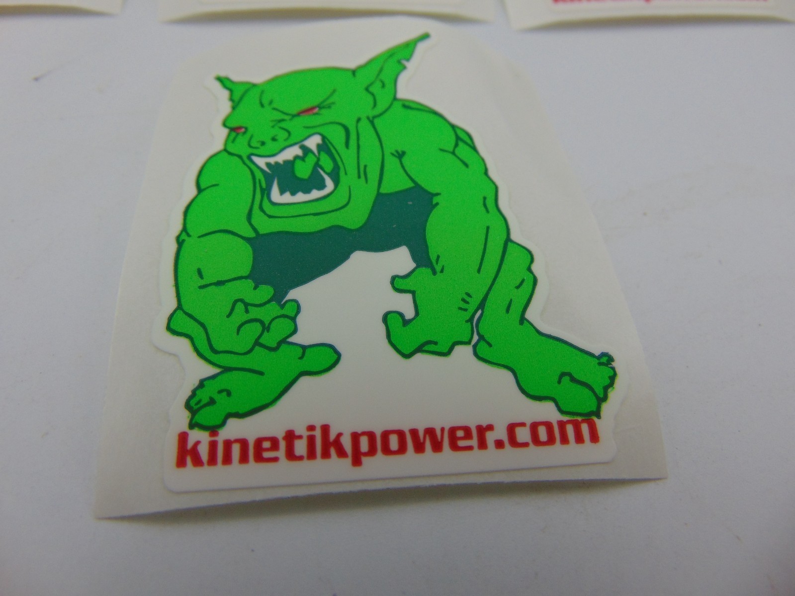 2″ Tall KINETIK POWER Battery Logo Plastic Decal Green Monster (lot of 10)
