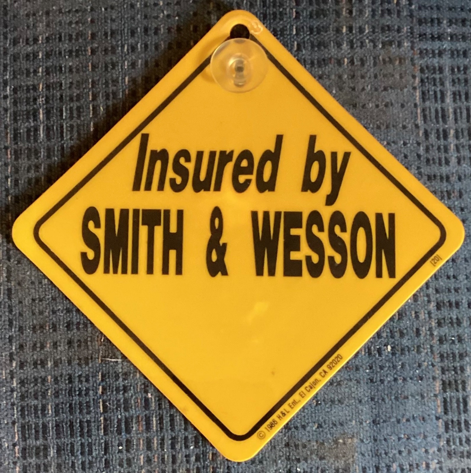 Insured by Smith & Wesson Vintage Car Plastic Decal Suction Cup Vintage 1986 5”