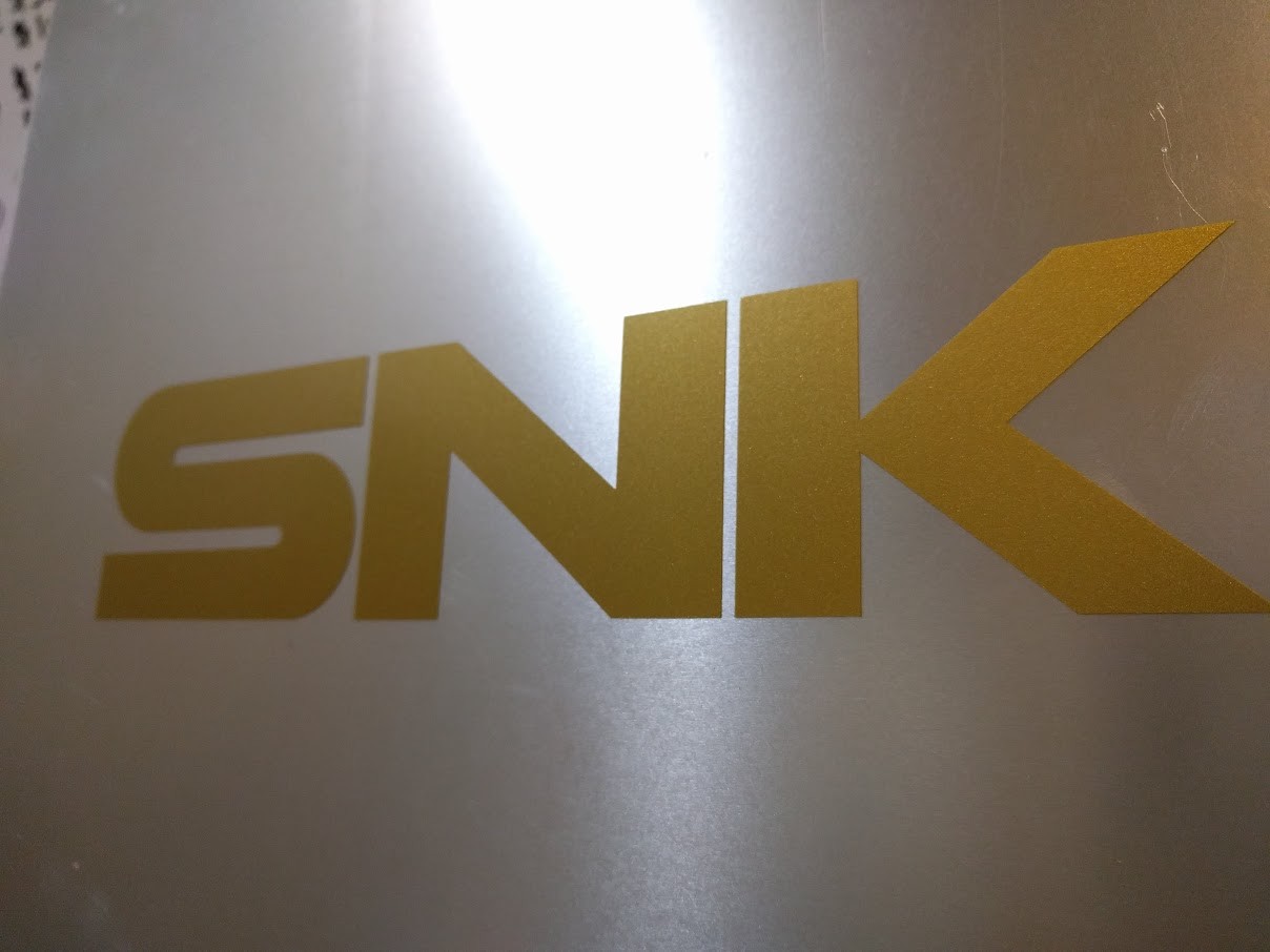 2 pack SNK text logo Vinyl sticker Gold Metallic 7 3/4″ x 1 3/4″ ( 200mm x 36mm)