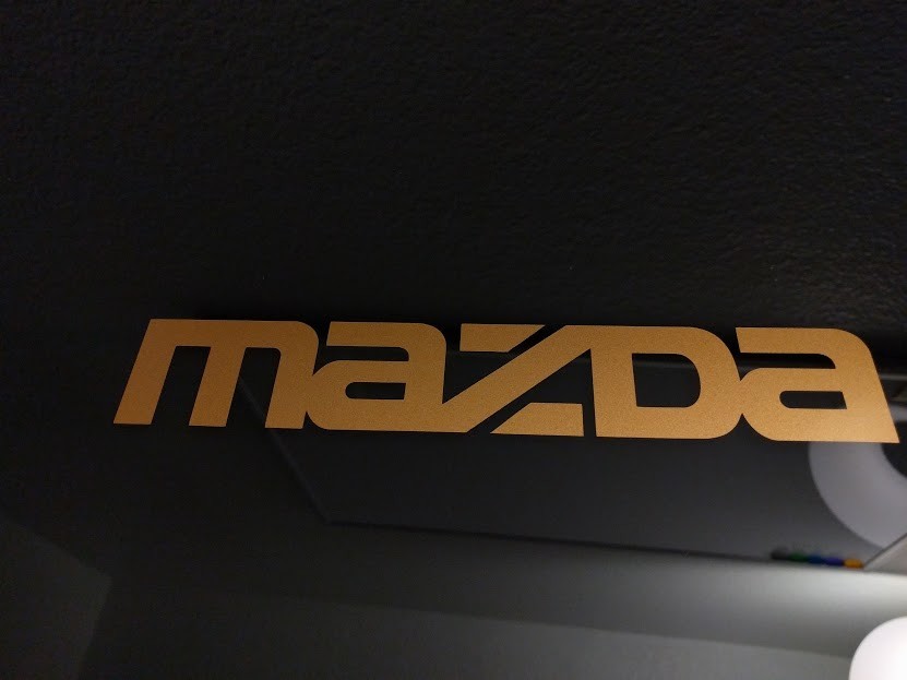 2 pack-Mazda logo Gloss Gold Metallic vinyl Decal Sticker 15.75″ x 2.75″